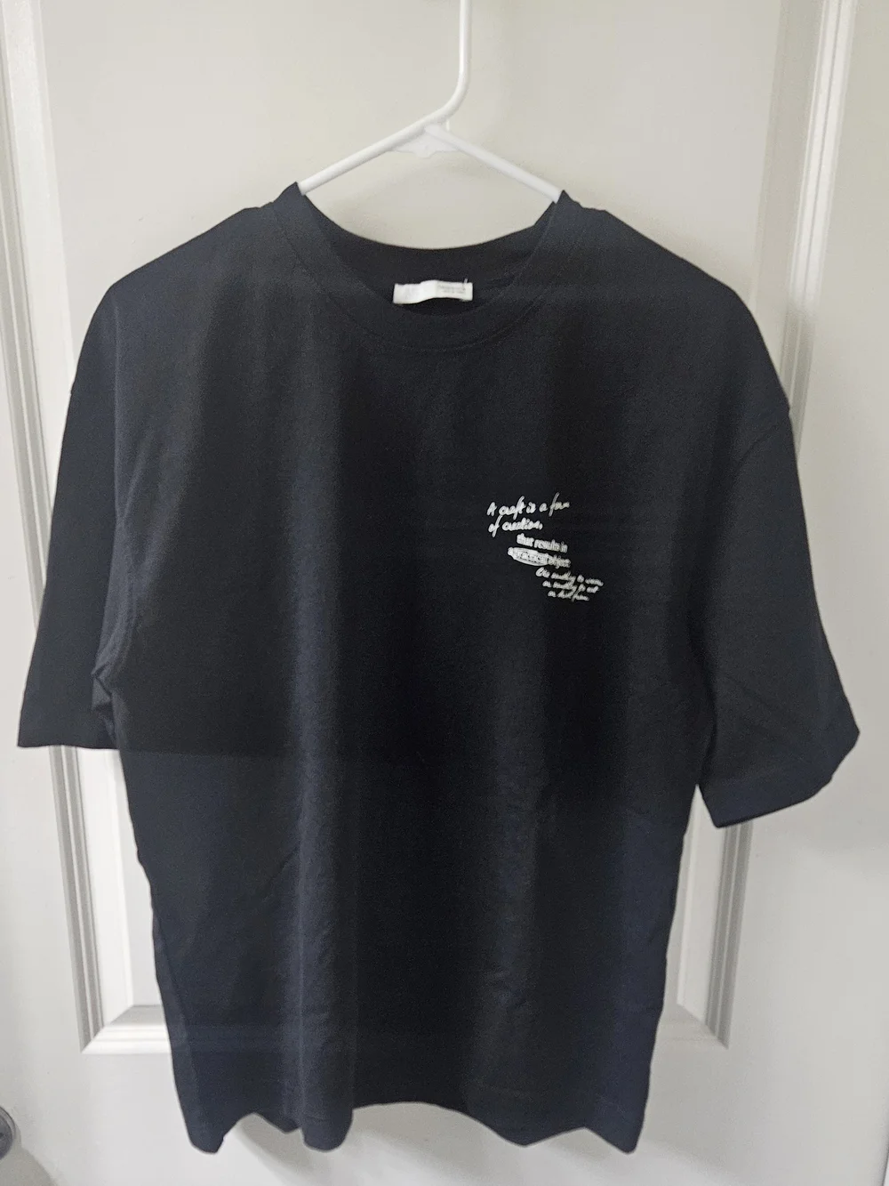 Zara Black Short-Sleeve Tee with Small White Chest Graphic - Picture 4 of 12